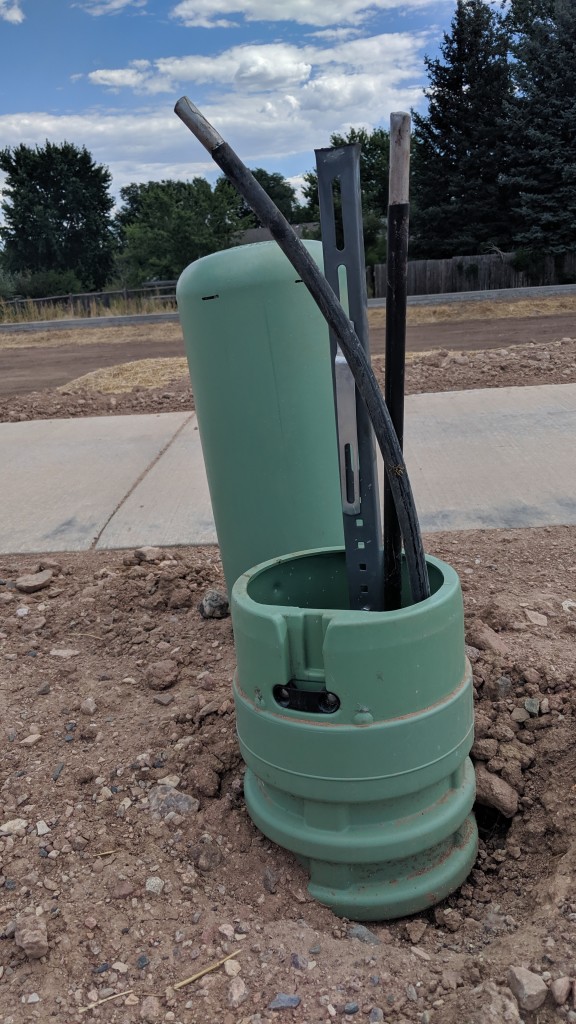 The future location of a tap for Comcast's coax network in a brand new neighborhood in Fort Collins.